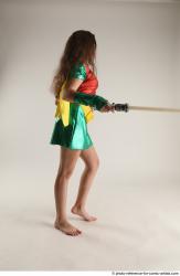 Woman Young Average White Fighting with sword Standing poses Casual